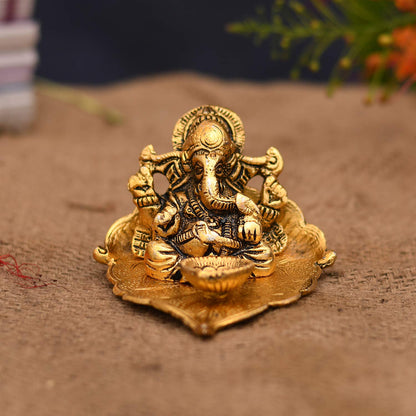 Ganesh Idol on Leaf - Lord Ganesha with Diya - Metal Hand Craved for Home Decorative Gift Puja Gifts Corporate - Brass Daddy