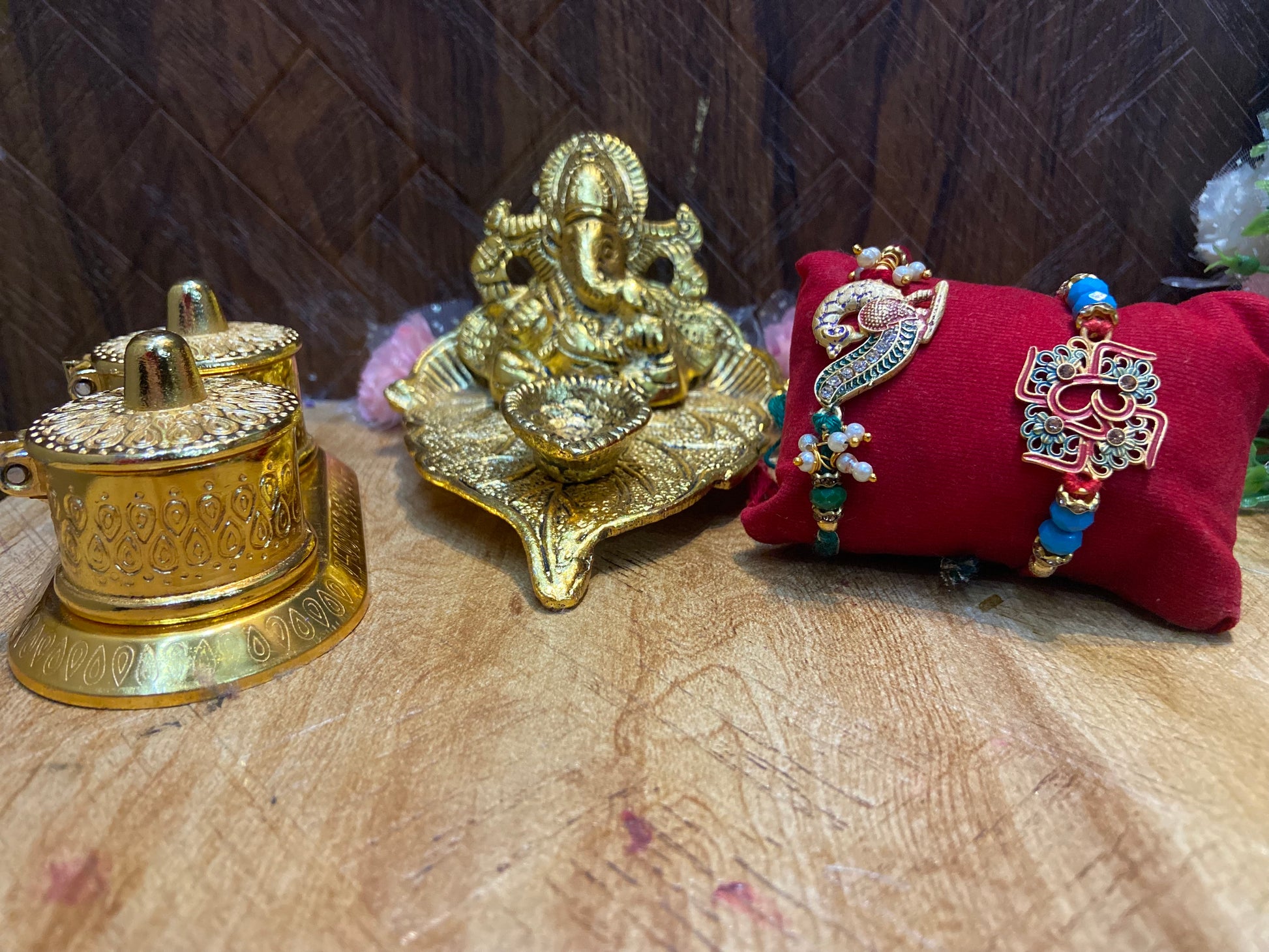 Rakhi combo - Ganesh diya, 2 rakhi and roli chawal box - Brass Daddy
