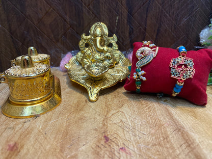 Rakhi combo - Ganesh diya, 2 rakhi and roli chawal box - Brass Daddy